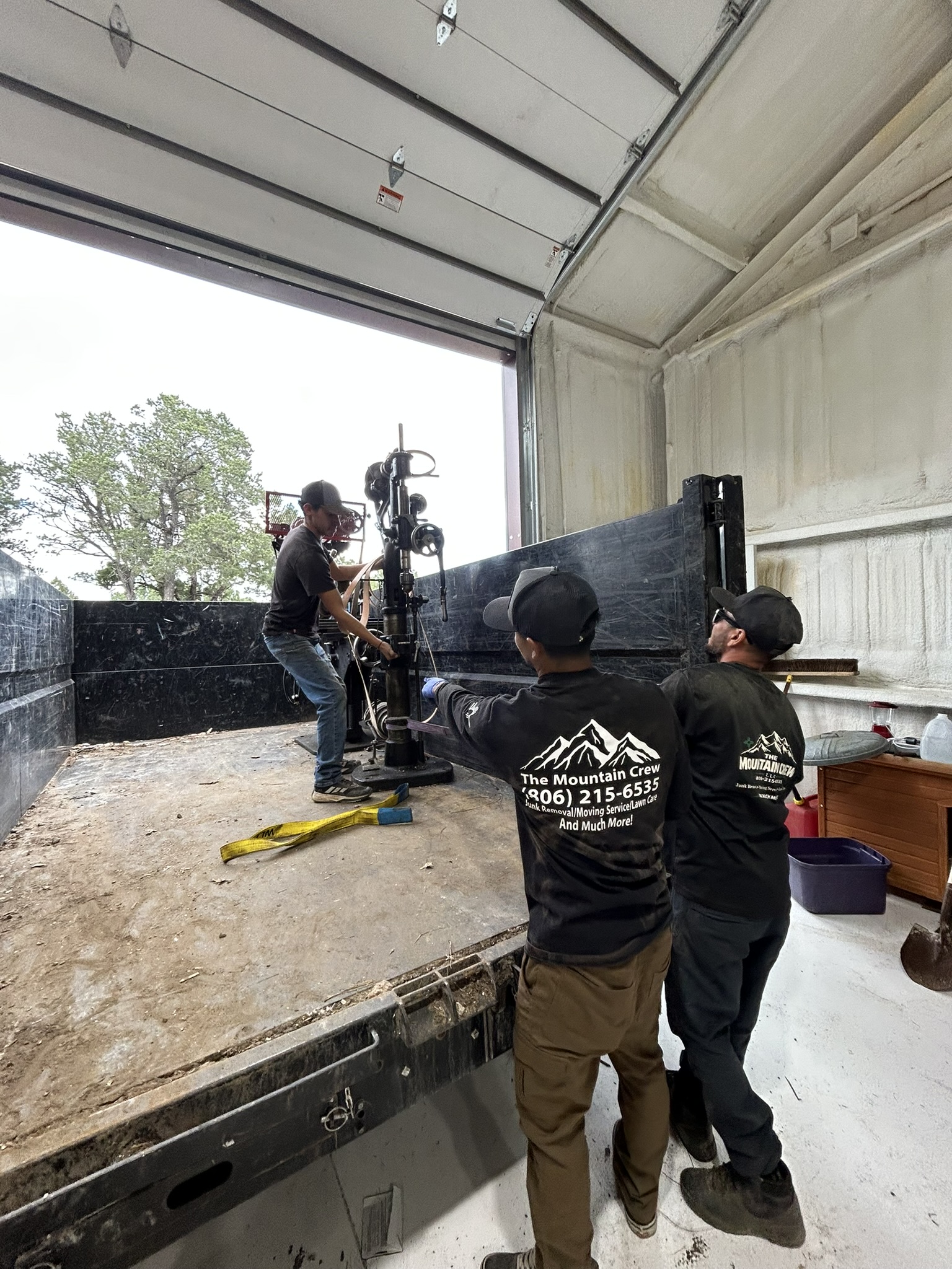 The Mountain Crew working together on a project